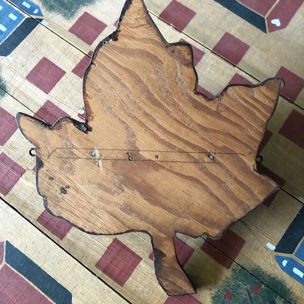 Wooden leaf shaped shelf
